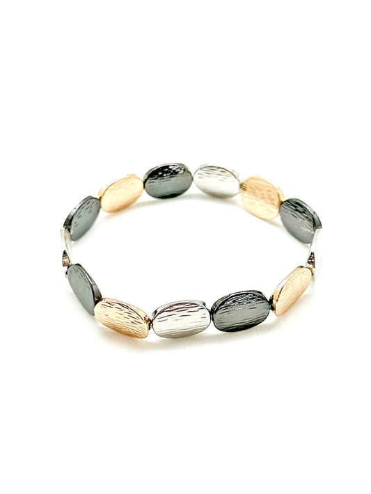 Gold, silver, and black metal oval bracelet