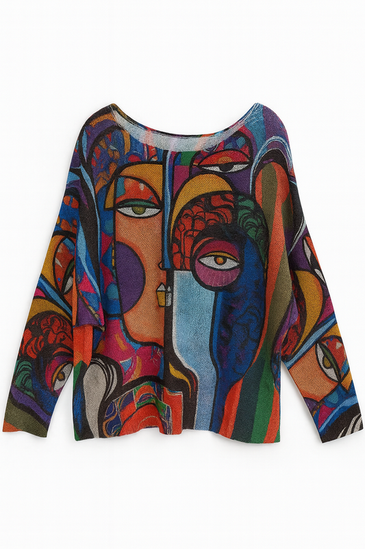 Blue knit long sleeve sweater featuring a colorful Picasso-inspired abstract face graphic on the front.