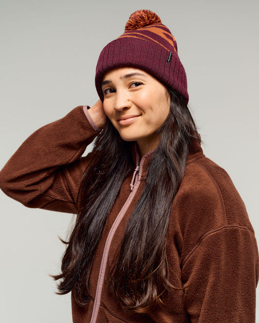 b1914_owr_braided_river_pom_pom_beanie_a_1773094135000