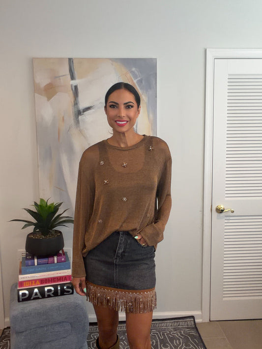 Bronze metallic long sleeve pullover sweater top with a crew neckline and floral embroidered embellishments on the front.