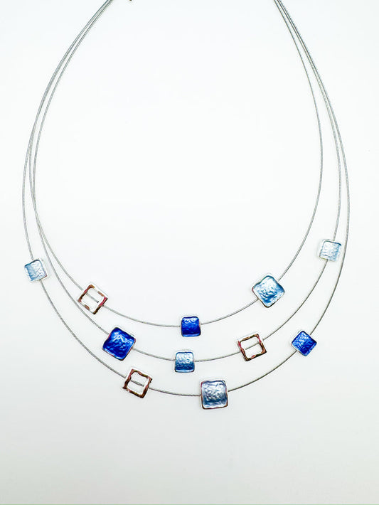 triple-layer necklace with square accents in cool blues with metallic open frames