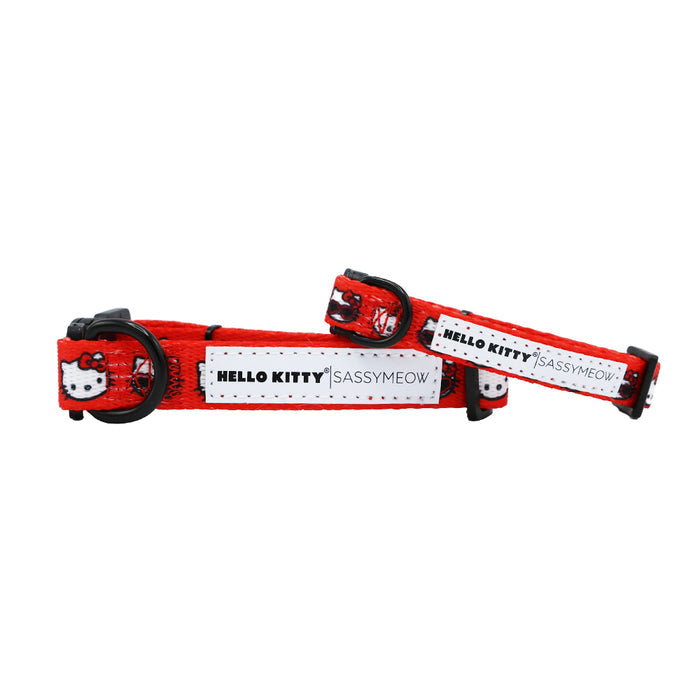Two red adjustable Cat Collar - Hello Kitty® Red Classic by Sassy Woof, with black hardware, Hello Kitty faces, and a white HELLO KITTY | SASSY WOOF label—perfect for any Sanrio fan.