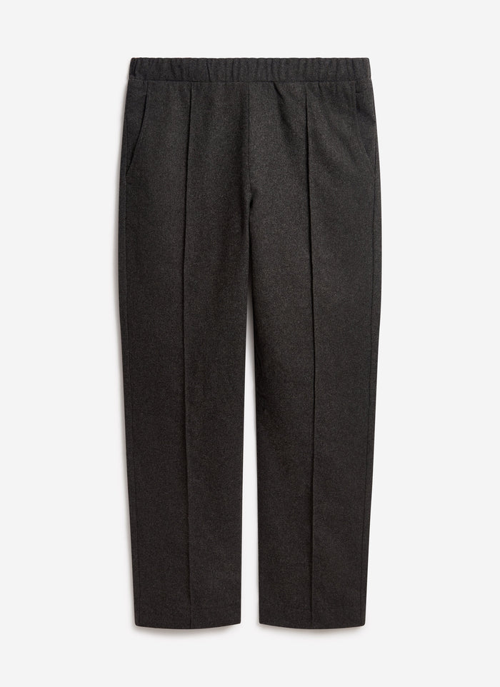 The Percival Caxton Smart Trousers in black brushed wool, laid flat against a simple white background.