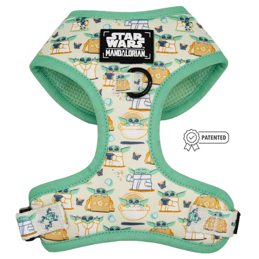 The Sassy Woof Dog Adjustable Harness - STAR WARS™ The Child™ is a mint green, no-pull harness with Grogu (Baby Yoda) and droid cartoons, plus a black Mandalorian patch on the front.