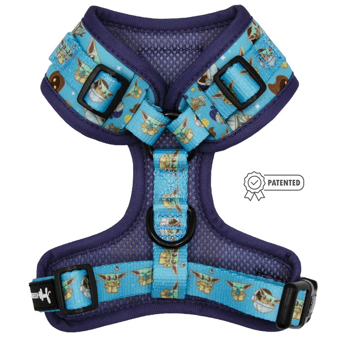 The Sassy Woof Dog Adjustable Harness - STAR WARS™ The Mandalorian™ features blue and purple straps with cartoon dogs and bones, plus a small PATENTED icon beside this no pull harness.