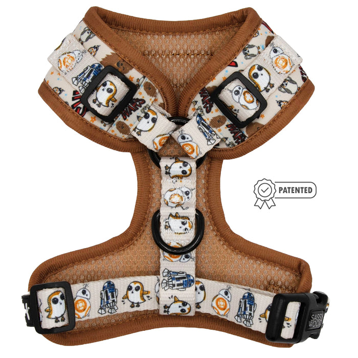 The Sassy Woof Dog Adjustable Harness - STAR WARS™ The Rebel Alliance features brown trim, black buckles, adjustable straps, a PATENTED badge, and Star Wars designs with R2-D2, BB-8, and Porgs.