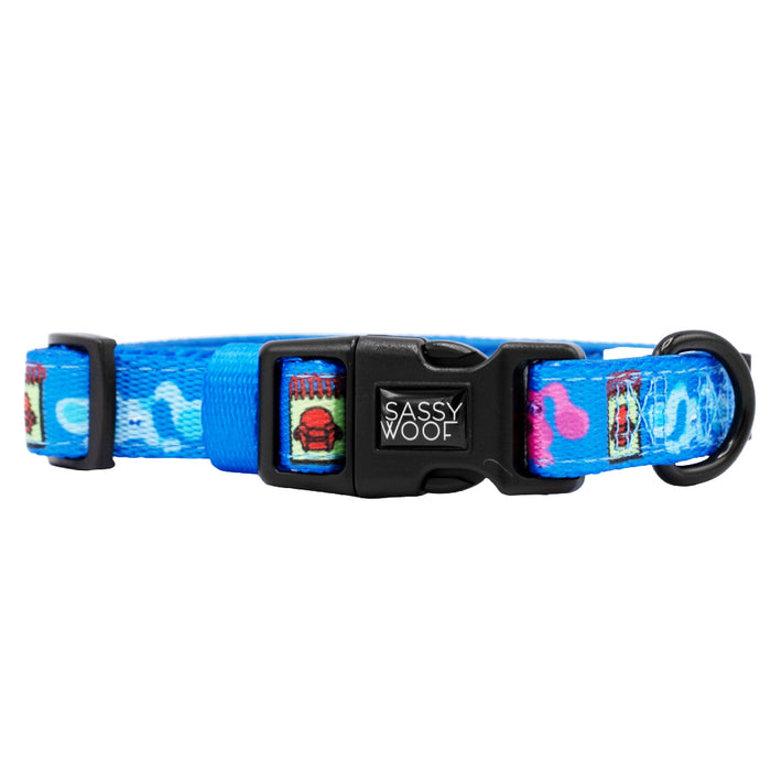 The Sassy Woof Dog Collar - Blue's Clues™ is a blue adjustable collar with a black plastic buckle, featuring playful fries, burgers, and drinks for a fun Nickelodeon accessory for your pup.