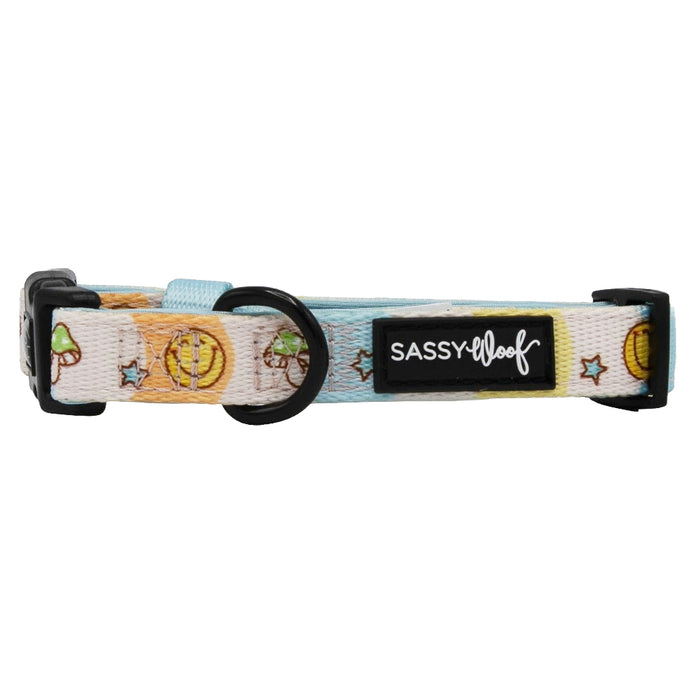 The Sassy Woof Dog Collar - Mush Love features a sleek logo, sturdy D-ring, and adjustable neoprene design for comfort and durability—perfect for your pup.