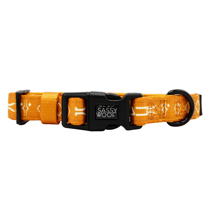 The Sassy Woof Dog Collar - STAR WARS™ Ahsoka features adjustable neoprene in orange with a black plastic buckle, a metal D-ring for leash attachment, and a subtle white pattern for style.