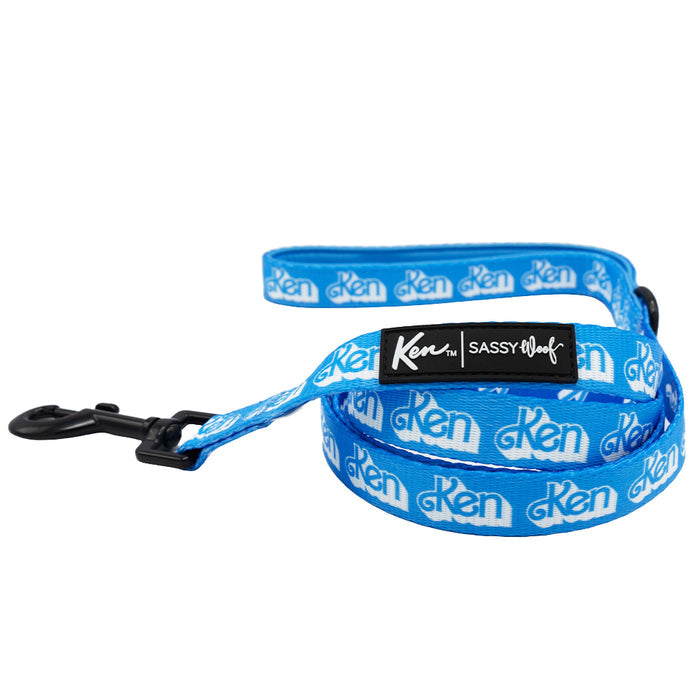 Add a touch of style to your pup’s walk with the Sassy Woof Dog Collar Three Piece Bundle - KEN™, featuring a blue leash decorated with repeating white Ken logos and finished with a sleek black clip. The leash also includes a black label that showcases both Ken and Sassy Woof branding, making it the perfect complement to your Ken collar or waste bag holder.