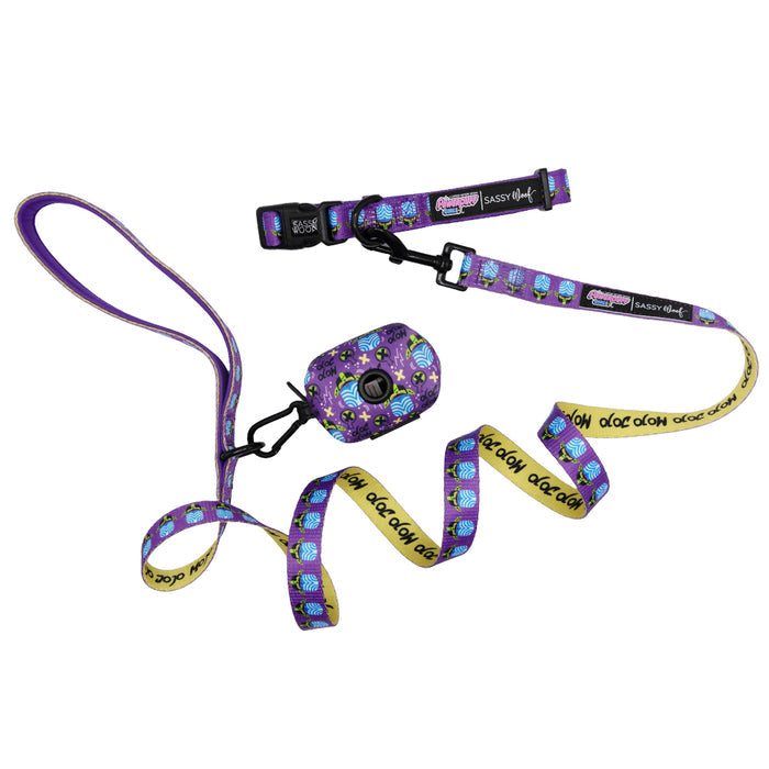 The Sassy Woof Dog Collar Three Piece Bundle - Mojo Jojo™ is a vibrant purple and yellow dog leash, collar, and poop bag holder set featuring a cartoon monster pattern on a white background—perfect for fans of playful styles and Powerpuff Girls pet accessories.