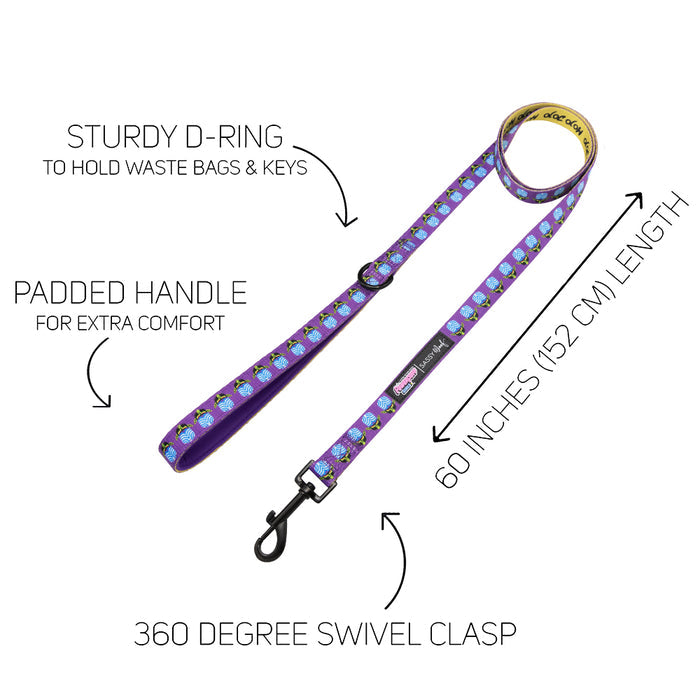 Mojo Jojo™ Dog Collar Three Piece Bundle by Sassy Woof, featuring a purple design with cartoon dogs inspired by the Powerpuff Girls. Labeled features include a sturdy D-ring, padded handle, 60-inch (152 cm) length, and 360-degree swivel clasp, with text highlighting each feature for clarity.