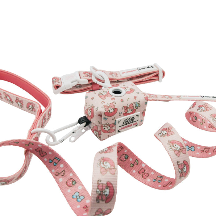 Sassy Woof Dog Collar Three Piece Bundle – My Melody™: an adorable Sanrio pet product set featuring a pink My Melody-themed design adorned with cute character prints, music notes, and bows, displayed on a plain white background.
