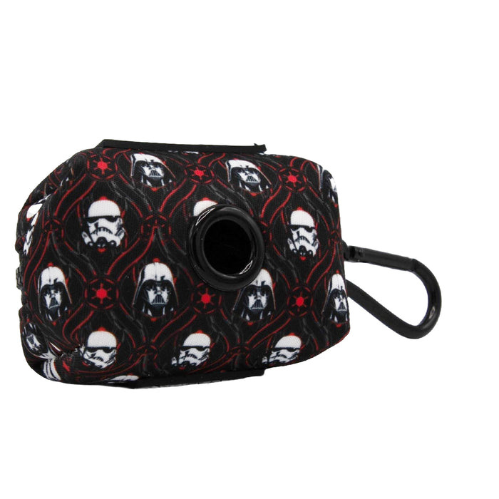 Keep your dog stylish on walks with the Sassy Woof Dog Collar Three Piece Bundle - STAR WARS™ The Dark Side. This small black pouch features a convenient side opening and is decorated with a bold red and white pattern showcasing Darth Vader and Stormtrooper helmets. Complete with a secure black clip, it easily attaches to your dog's collar or leash for hands-free convenience.