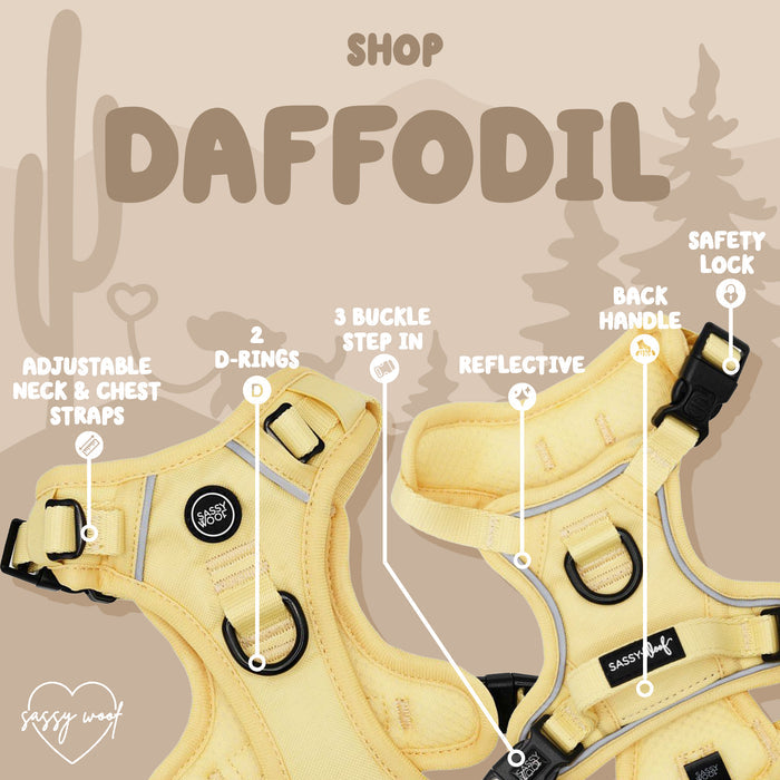 The Sassy Woof Dog Four Piece Bundle - Daffodil features a yellow step-in harness with adjustable straps, 2 D-rings, reflective material, back handle, safety lock, and a desert-themed background.