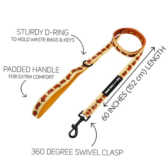 The Sassy Woof Dog Four Piece Bundle - Hot Dawg includes a yellow dog leash with a fun dog print, padded handle, sturdy D-ring for waste bags and keys, 360° swivel clasp, and measures 60 inches (152 cm) long.