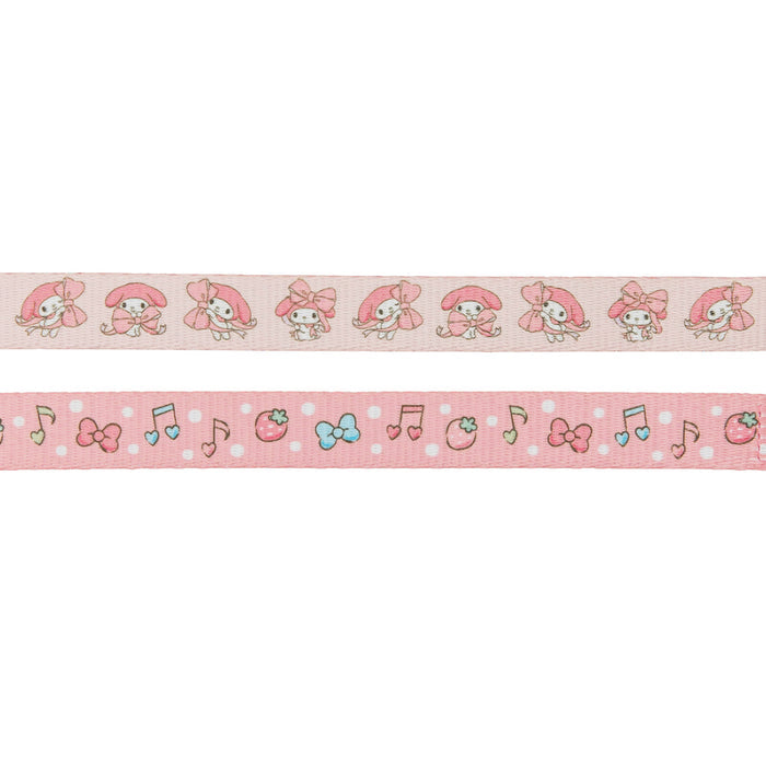 The Dog Four Piece Bundle - My Melody™ by Sassy Woof features two pink ribbon strips: the top with a cartoon bunny in a pink hood, and the bottom adorned with music notes, bows, strawberries, and cherries.