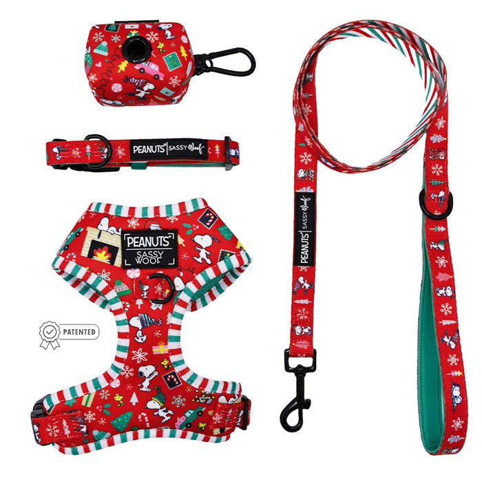The Sassy Woof Dog Four Piece Bundle - Peanuts™ Beagle Bells features a red Snoopy and Woodstock holiday design harness, leash, collar, and waste bag holder—perfect Peanuts holiday accessories for your pup.