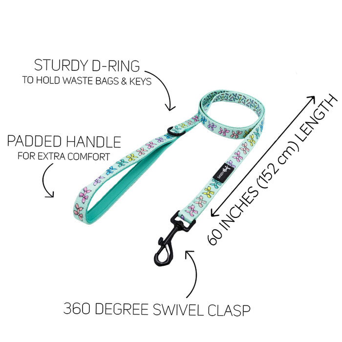 The Sassy Woof Dog Four Piece Bundle - Pup Pup Hooray includes a turquoise leash with colorful bones, padded handle, sturdy D-ring for waste bags or keys, 360° swivel clasp, and is 60" (152 cm) long—ideal to pair with an adjustable harness. Arrows highlight key features.