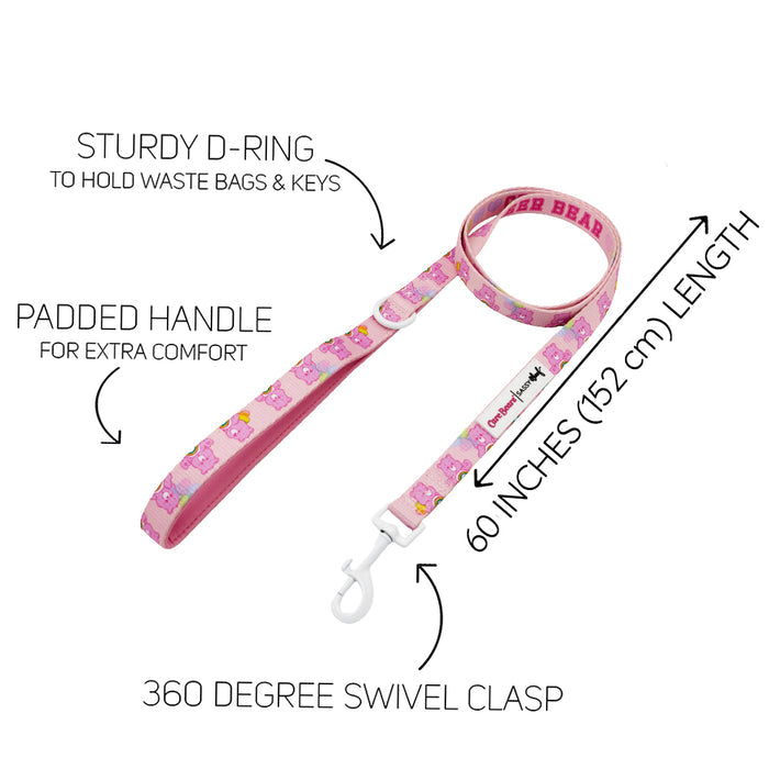The Sassy Woof Dog Leash - Care Bears™ Cheer Bear is a pink leash with cartoon bears, a sturdy D-ring for keys or bags, padded handle, 60-inch (152 cm) length, and 360° swivel clasp.