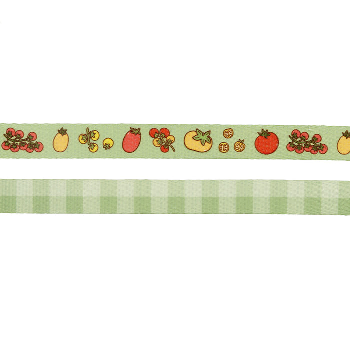 The Sassy Woof Dog Leash - Feeling Vine features two horizontal ribbons: a light green one with cartoon tomatoes and slices on top, and a plant-inspired light green bottom ribbon with a subtle checkered pattern.