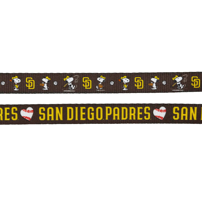 The Sassy Woof Dog Leash – MLB™ x Peanuts™ San Diego Padres™ features Snoopy in a Padres cap, playful bats, SD logo, team hearts, and baseball stitching—all perfect for fans of dog accessories and the Padres.