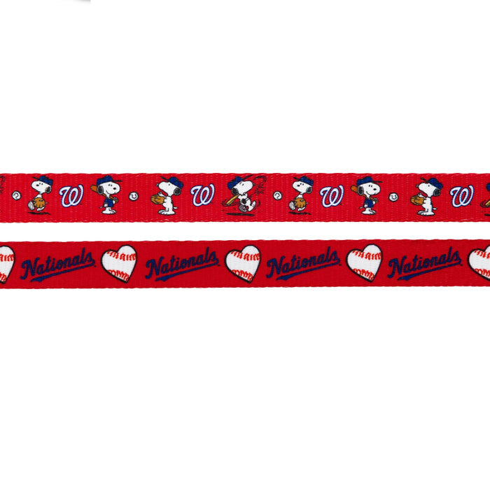Two red Sassy Woof Dog Leashes—MLB™ x Peanuts™ Washington Nationals™: one with cartoon dogs in baseball caps, baseballs, and the Nationals “W” logo; another with heart-shaped baseballs and “Nationals” in blue script.