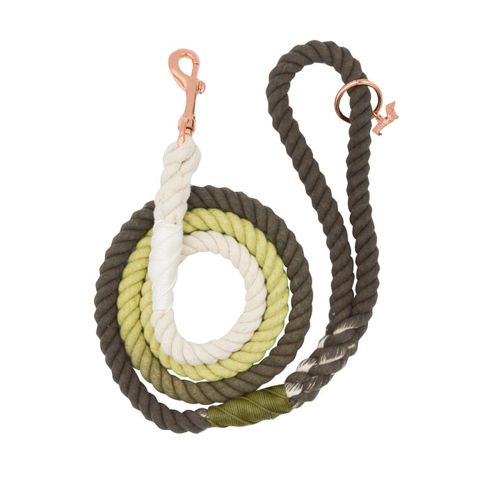 The Sassy Woof Dog Rope Leash - Ombre Olive is a hand-crafted leash with a white to green to dark brown gradient and features a rose gold metal clip and ring.