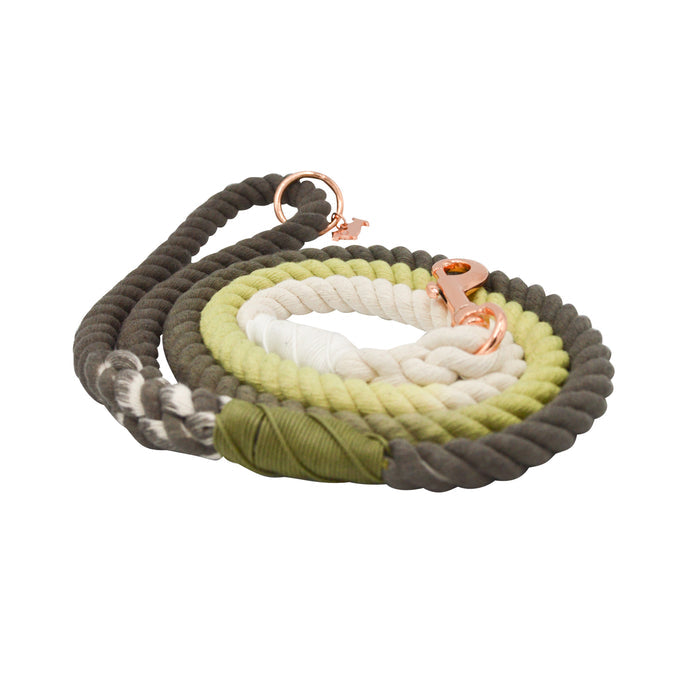 The Sassy Woof Dog Rope Leash - Ombre Olive is a hand-crafted leash in gray, green, and cream shades, featuring a rose gold clasp and small attachment ring.