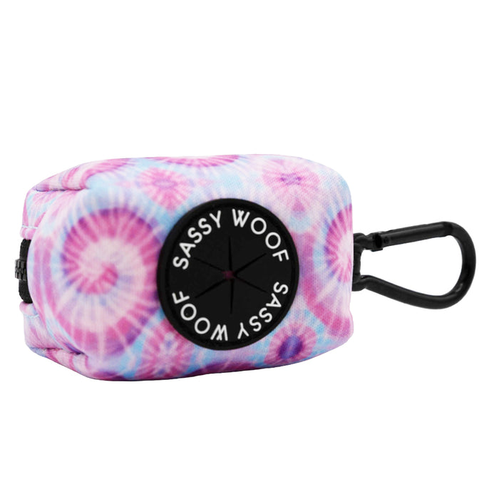 The Sassy Woof Dog Three Piece Bundle - Purple Haze includes a small, rectangular tie-dye waste bag holder with a black clip and “Sassy Woof” logo, perfect for attaching to your Purple Haze dog collar or leash.