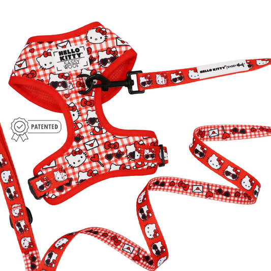 The Sassy Woof Dog Two Piece Bundle - Hello Kitty® Red Classic features a red and white plaid adjustable harness and leash set with Hello Kitty designs, a “Hello Kitty | Sassy Woof” label, and a patented badge icon.
