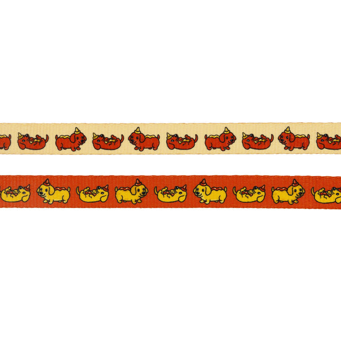 The Sassy Woof Dog Two Piece Bundle - Hot Dawg features cream and orange ribbons with playful red and yellow dachshund patterns—ideal for crafting an adjustable harness or a matching whimsical dog leash.