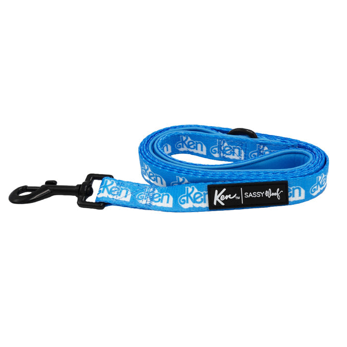 The Sassy Woof Dog Two Piece Bundle - KEN™ includes a blue dog leash with “Ken” text, black metal clasp, and “Ken x Sassy Woof” label—ideal to pair with the adjustable harness from the Ken collection.