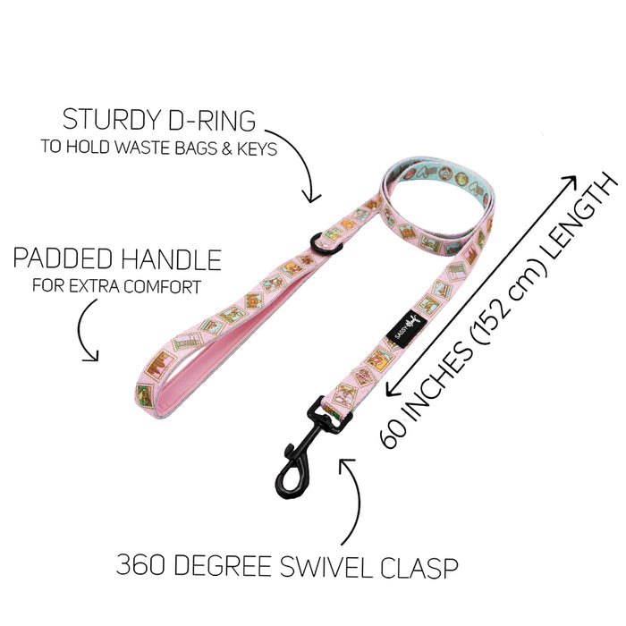The Sassy Woof Dog Two Piece Bundle - Out of Office features a pink leash with cartoon graphics, padded handle, sturdy D-ring, 60-inch length, and 360° swivel clasp. Pairs perfectly with our adjustable harness. Shown on a white background.