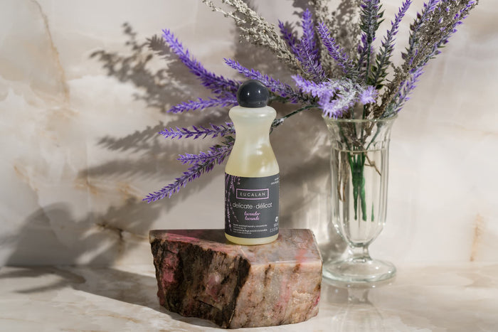 Bottle of Eucalan Detergent on rock