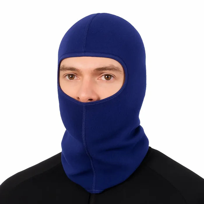 Man wearing a Sub Zero Factor 2 thermal mid layer balaclava in navy on a white background