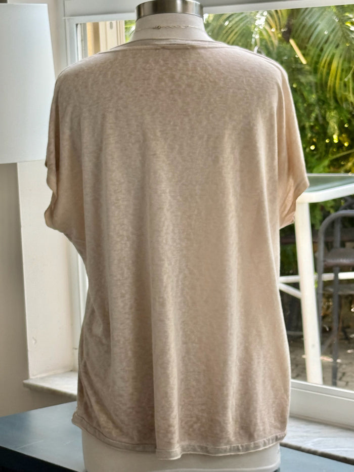 back of beige v-neck top
