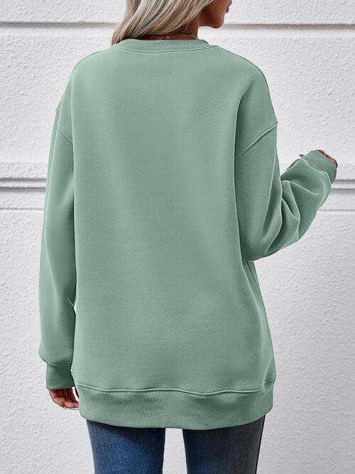Graphic Round Neck Dropped Shoulder Sweatshirt - Madikfashions.com