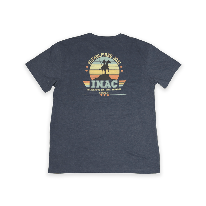 Image of the back of the INAC Established Tee featuring the logo and established year 2021.