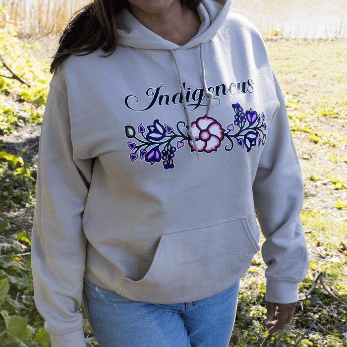 Indigenous Floral Hoodie featuring colorful floral patterns, showcasing cultural designs in a stylish and comfortable way.
