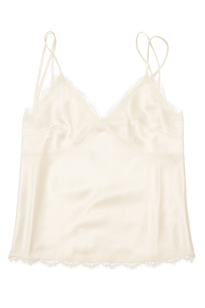 Ivory satin cami top with delicate lace trim at the neckline and hem and slim adjustable straps.