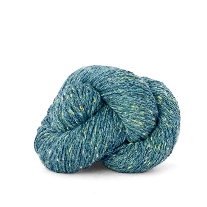 Blue skein of yarn on a white background