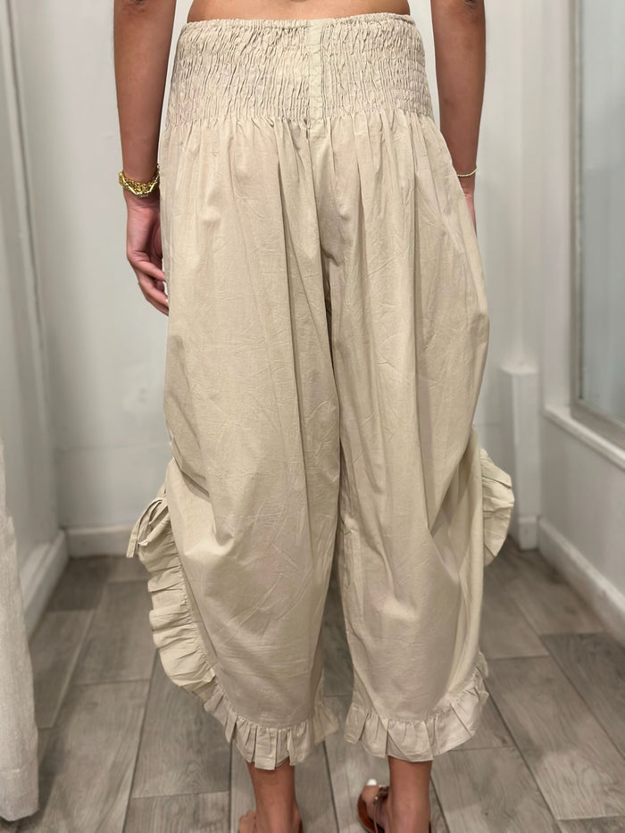 back view of woman wearing pants