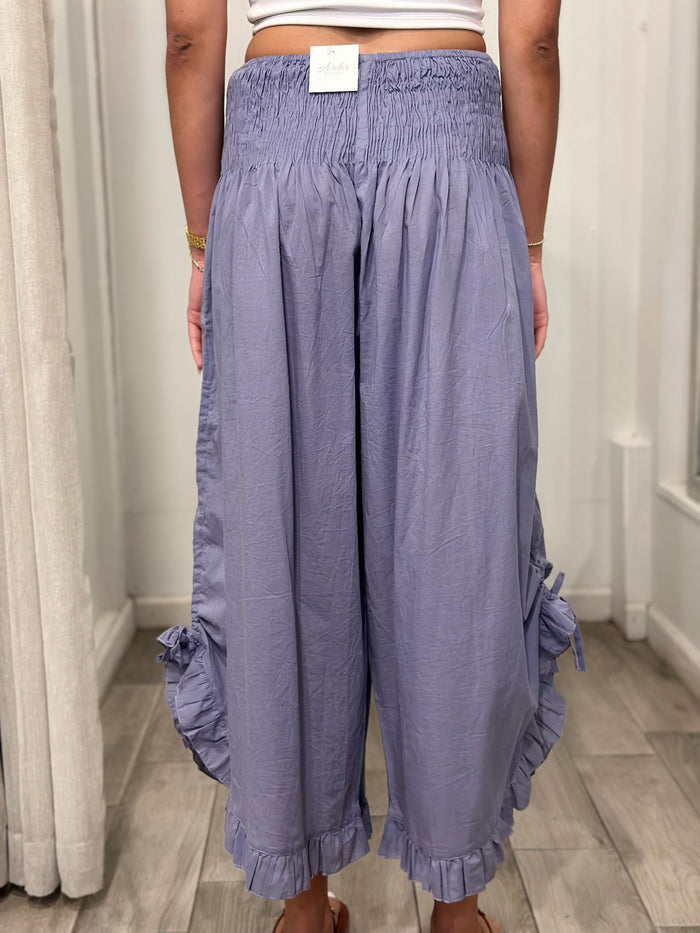 back view of  woman wearing one size pants