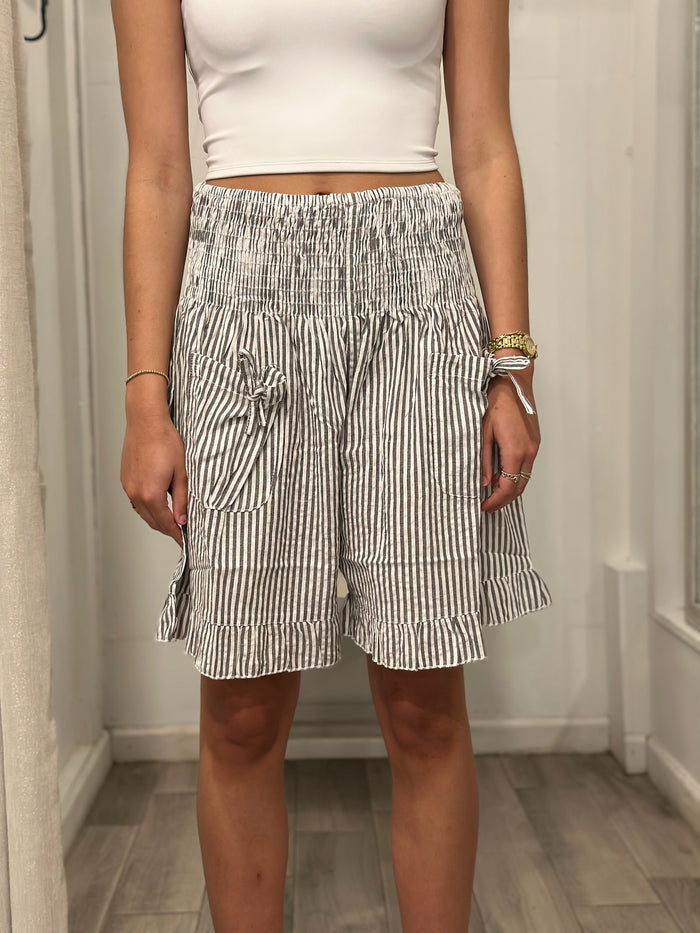 front view of woman in shorts