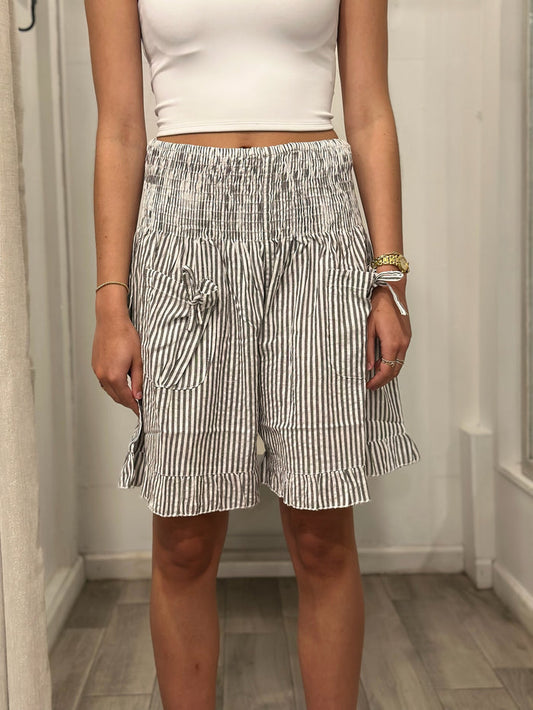 front view of woman in shorts