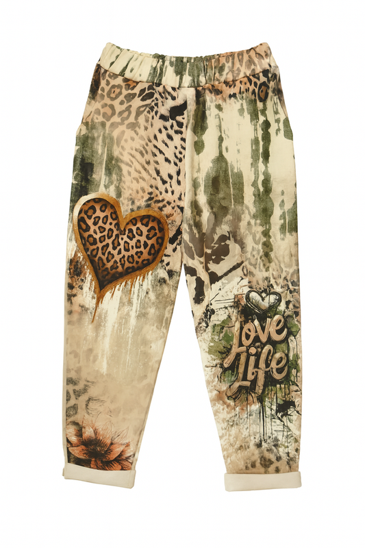 Leopard print joggers with an elastic waist, heart graphic, Love Life script, and cuffed hem details.