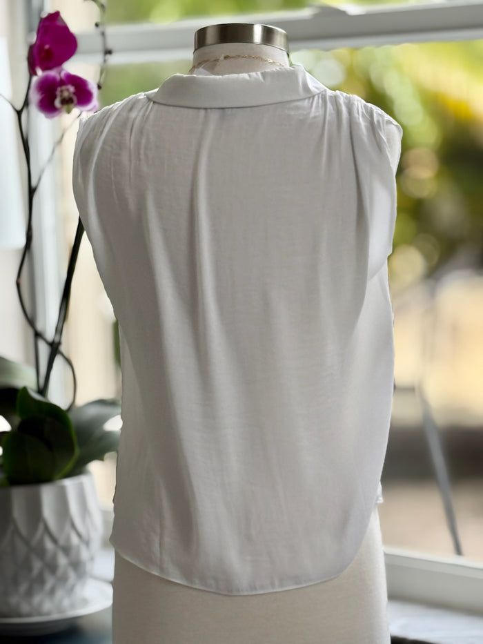 back of white blouse