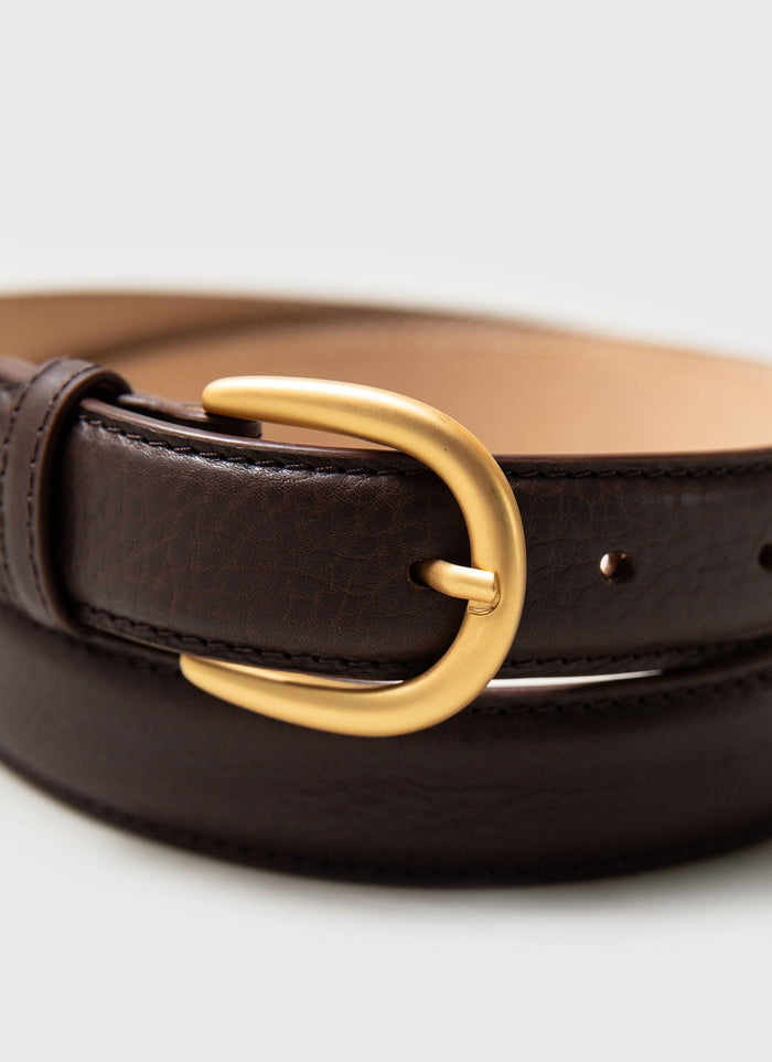 Close-up of the Percival Men's Leather Dress Belt in brown, highlighting the matte gold buckle and detailed stitching.