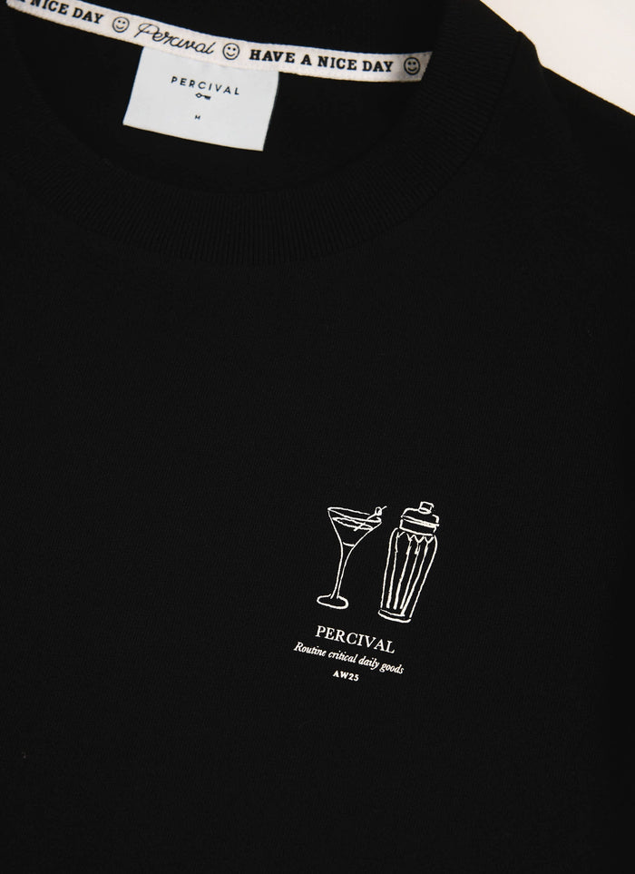 A close-up of the Percival Mixologist T Shirt in black, showing the cocktail and shaker graphic print on the chest.